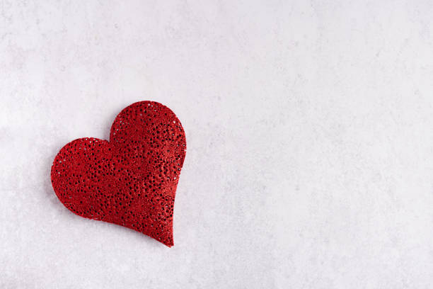 istock red heart on gray background, copy space , valentine's greeting card 1289254998