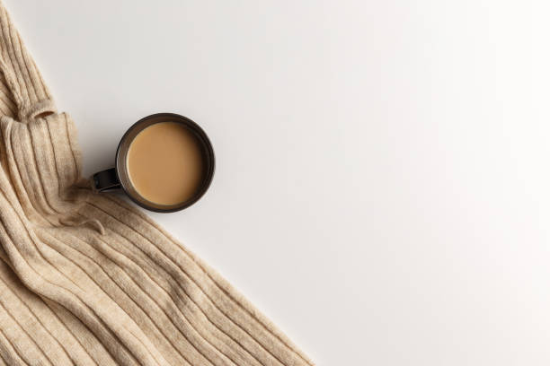 istock Abstract autumn composition. Colorful background image. Autumn, winter concept. Top view. Flat lay. Copy space. Plaid, cup of coffee on white background. Thanksgiving day concept 1289255576