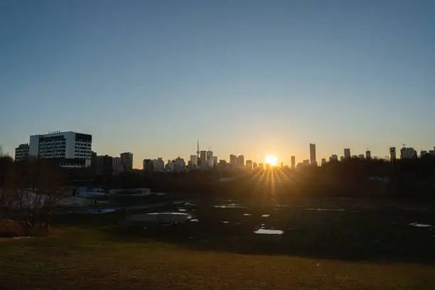 Toronto City Skyline at sunset from Riverdale Park in Ontario Canada