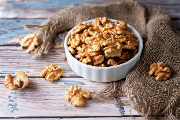istock raw dried healthy walnuts nuts on a background 1289256368