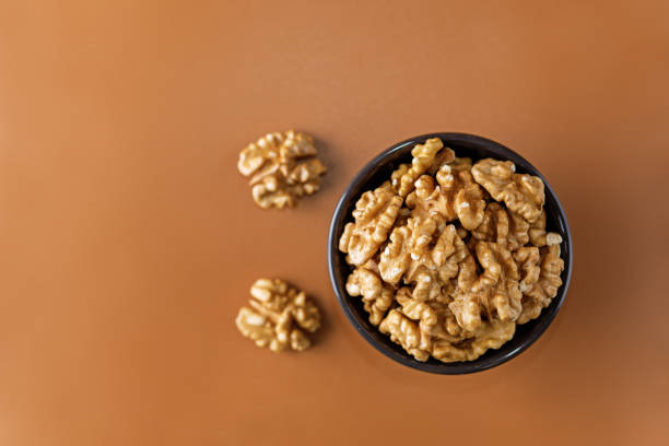 istock raw dried healthy walnuts nuts on a background 1289256379