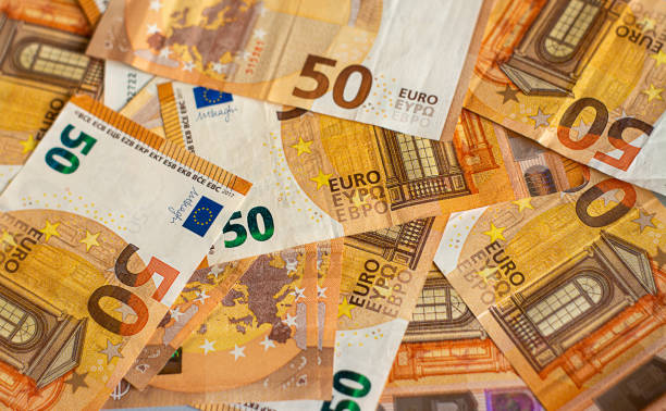 euro money of european union, 50 euro banknotes background, face value 50 euros, - european union euro note european union currency paper currency currency imagens e fotografias de stock