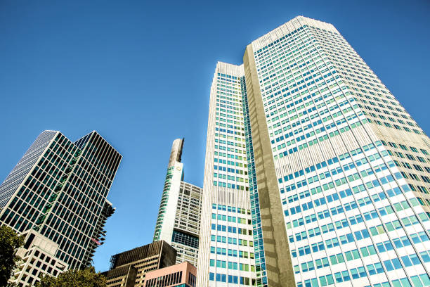 istock Frankfurt on Main, Germany, 27 september 2018. Modern beautiful new skyscraper in the bussines part of the city against the blue sky on a sunny day 1289259499