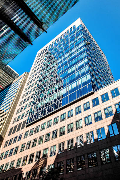 istock Frankfurt on Main, Germany, 27 september 2018. Modern beautiful new skyscraper in the bussines part of the city against the blue sky on a sunny day 1289259503