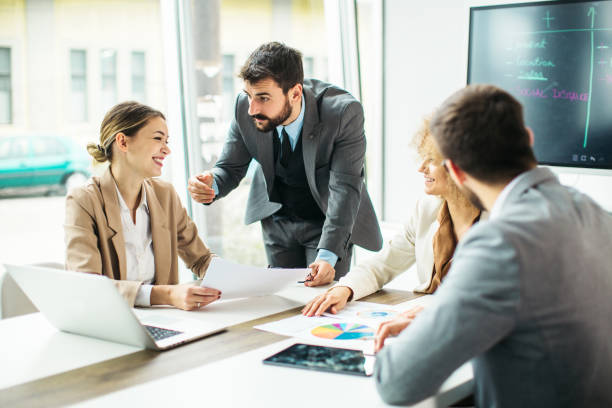 istock Group of business people working inside modern office 1289259771