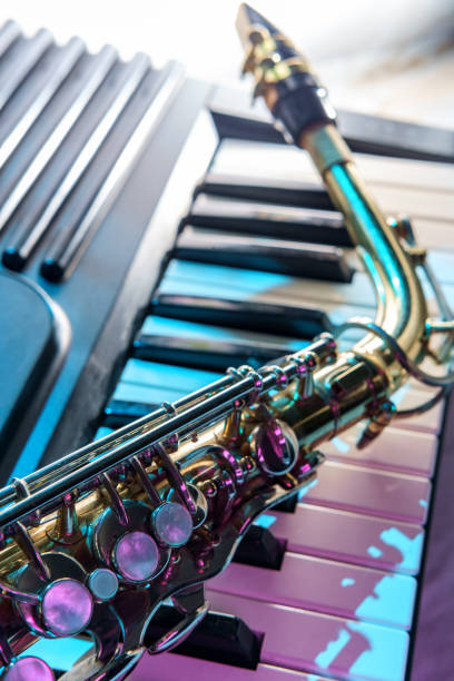 istock Old Saxophone Piano Keyboard 1289262118