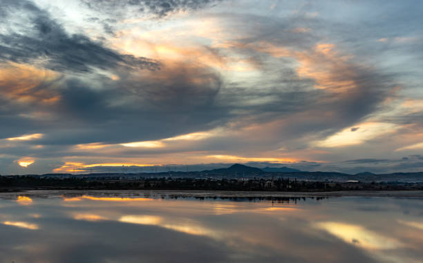 istock Colourful sunset twilight sky at a salt lake. Larnaca Cyprus 1289268661