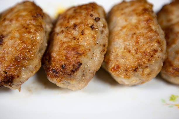 istock Fried delicious meat cutlets on a white plate 1289268697