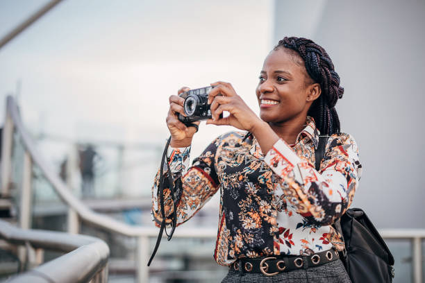 istock Cheerful young woman exploring her destination 1289269108