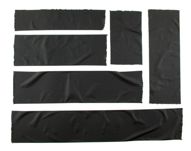 set of torn and crumpled pieces of black adhesive tape on white background. creased different size black sticky tape. - adhesive tape imagens e fotografias de stock