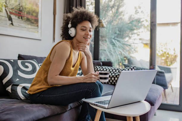 istock A woman is working from home and holding coffee cup 1289270237