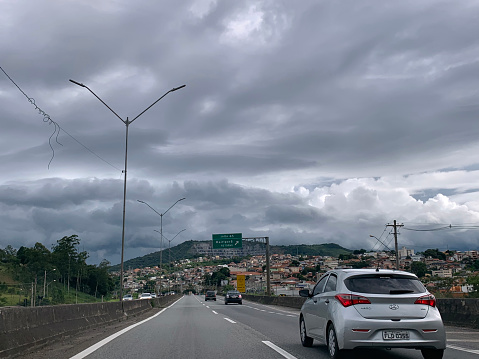 March 3, 2019. Mairiporã, SP, Brazil. Car driver's point of view on the way to São Paulo. Summer rain typical of March.