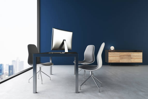 istock Contemporary office interior with computer on table and megapolis city view. 1289274571