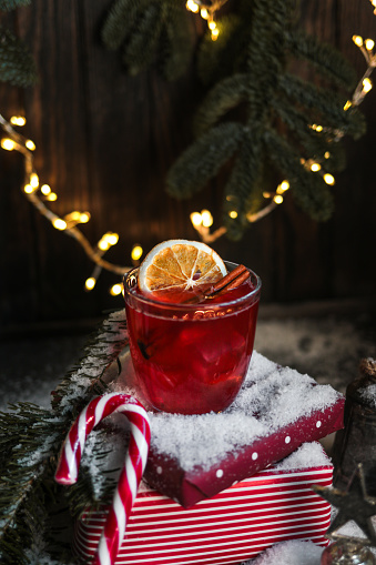 Red Christmas Mulled Wine Cocktail in snow scene