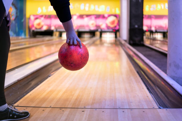 istock Unrecognizable young woman Playing Bowling 1289274783