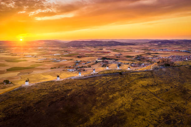 aerial view of traditional medieval spanish windmills in Consuegra at sunset. Castilla La Mancha, Spain