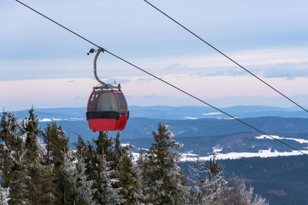 istock Gondolas of ski flit in Beskid Sadecki mountain range 1289278066