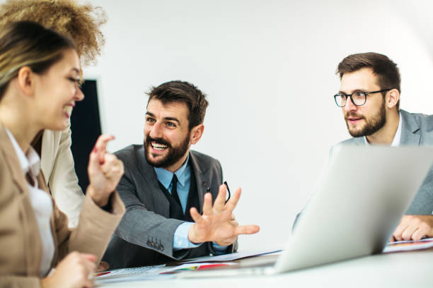 istock Group of business people working inside modern office 1289278127