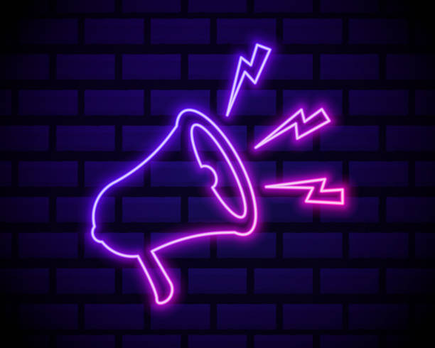 istock Latest news neon light announcement poster template . Megaphone icon isolated on dark brick wall background 1289278205