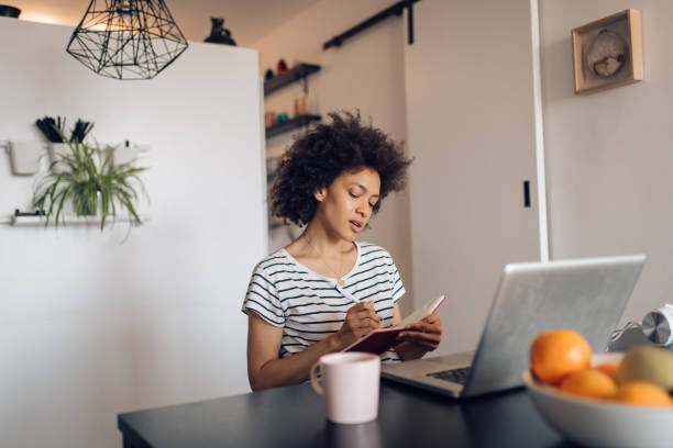 istock Young Afro businesswoman  working from her home office 1289280459