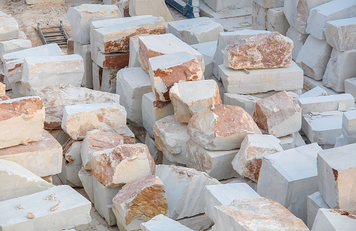 Stacked large group of marble blocks in a marble quarry