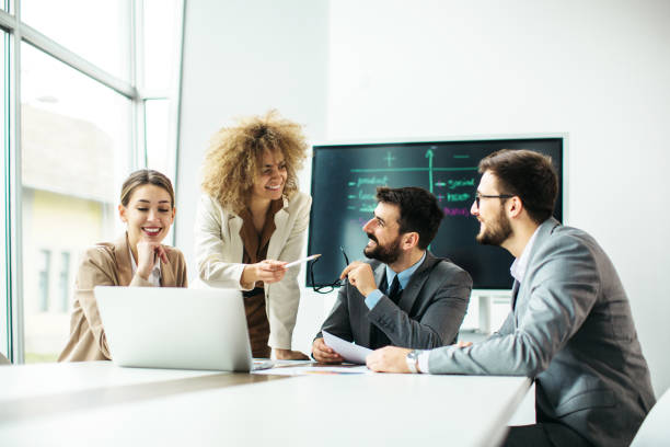 istock Group of business people working inside modern office 1289287945