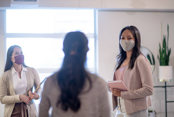 istock Businesswomen discussing 1289289202