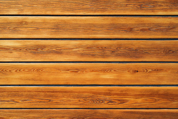 istock Brown rough wooden planks background, copy space 1289290321