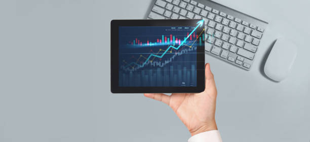 istock Business plan graph growth  increase of chart positive indicators in his business,tablet in hand 1289299640