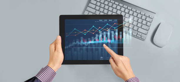 istock Business plan graph growth  increase of chart positive indicators in his business,tablet in hand 1289299647