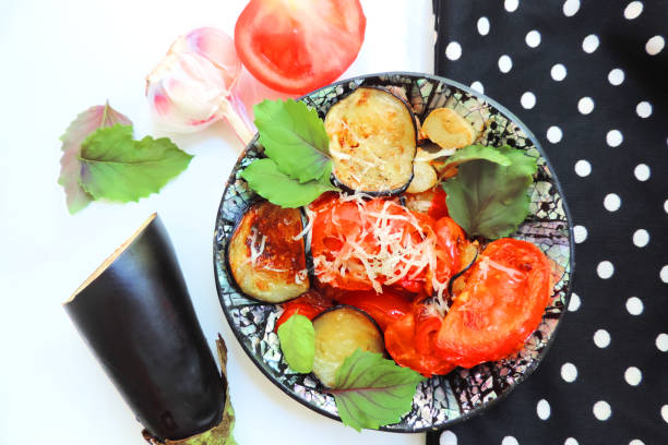 istock sauteed eggplant tomato and bell pepper, with cheese, garlic and herbs 1289302554