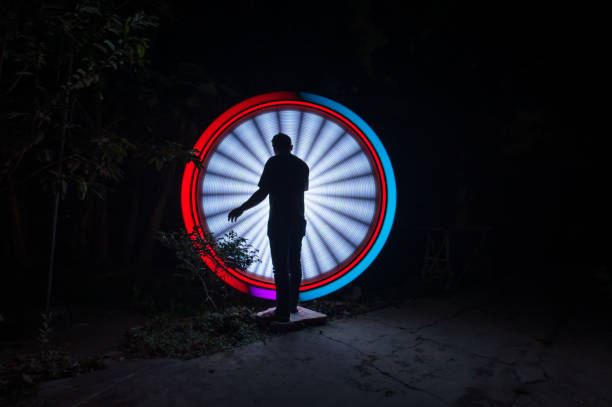 istock People with beautiful circle light painting 1289303562