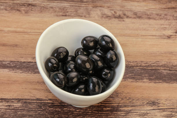 Marinated Black olives in the bowl