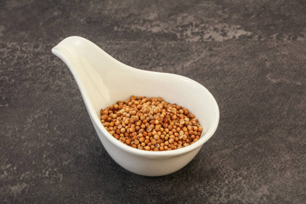 istock Coriander seeds in the bowl 1289315999