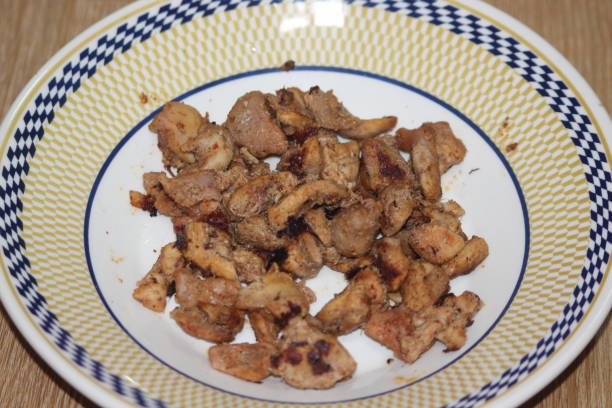 istock Macro closeup with selective focus on grilled chicken meat steaks. 1289319823