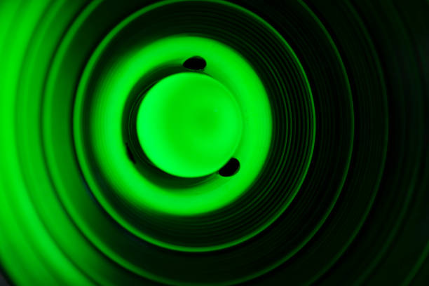 istock Abstract circles light green bokeh background - Blurred green nature background with soft focus 1289320019