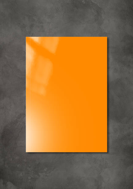istock Orange Booklet cover template on dark concrete background 1289325194