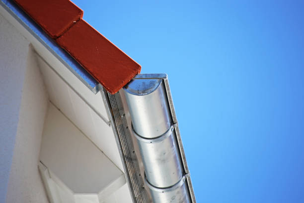 istock Roof gutter on a new tiled roof 1289326235