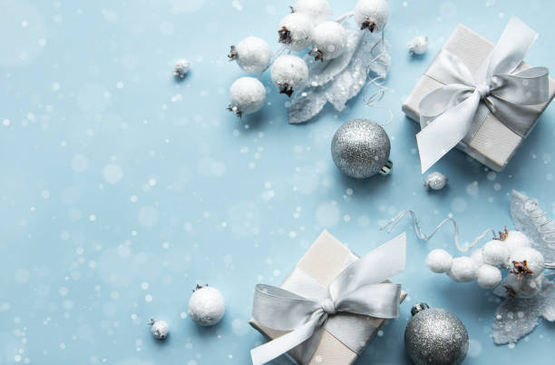 istock Frame made of white decorations on pastel blue background 1289327242