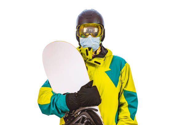 istock isolated man in ski equipment with snowboard 1289329100