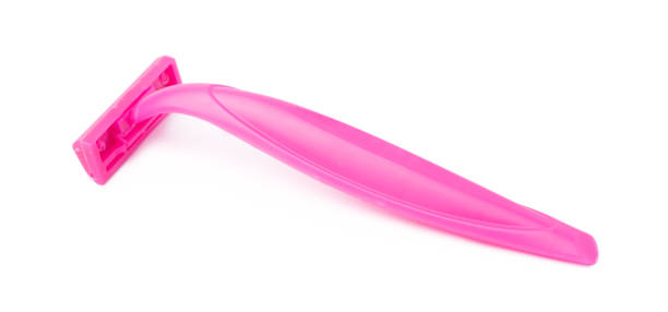 istock Female pink razor shaver isolated on white background 1289329478