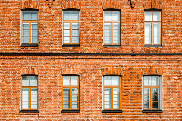 istock Beautiful vintage red brick building at sunny day 1289330511