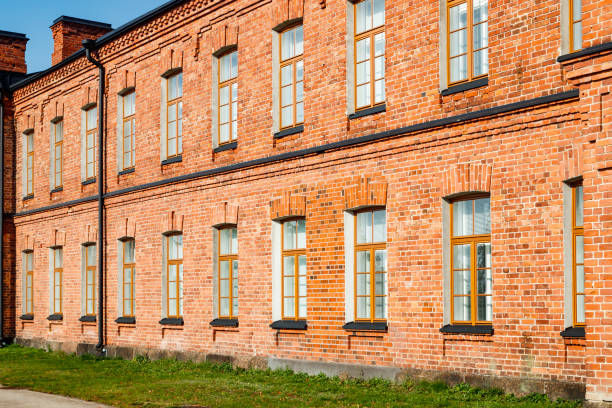 istock Beautiful vintage red brick building at sunny day 1289330526