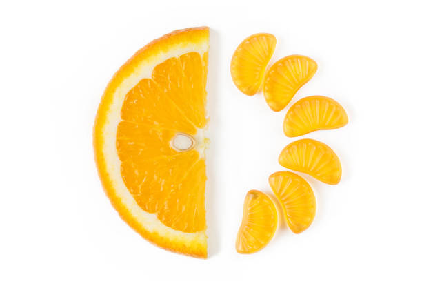 circle, citrus, closeup, cut, dessert, diet, drink, exotic, food, fresh, freshness, fruit, half, health, healthy, jelly, jelly sweets, juice, juicy, leaf, natural, nutrition, orange fruit, orange jelly, orange leaf, orange slice, organic, piece, raw, refreshment, ripe, round, section, segment, slice, sliced, studio, sweet, taste, tasty, tropical, vegetarian, vitamin, white, white background, whole, yellow