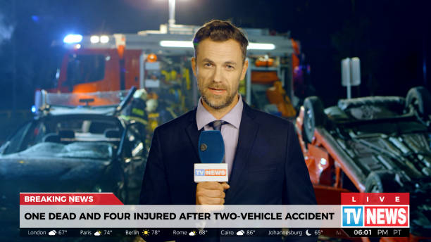 istock Reporter covering traffic disaster 1289331582