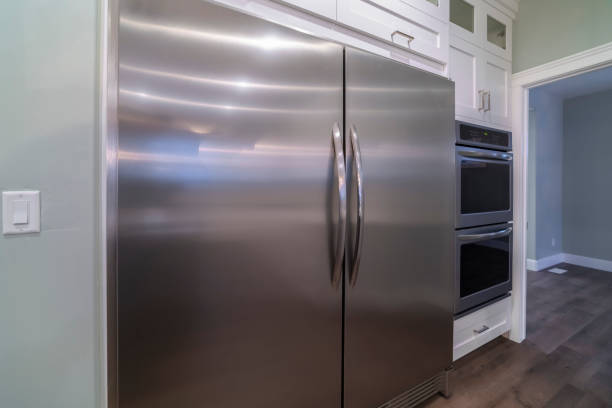 istock Large double door American fridge in a kitchen 1289332963