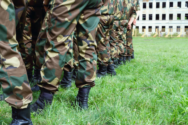 istock The military are in a row, camouflage, ankle boots 1289333972