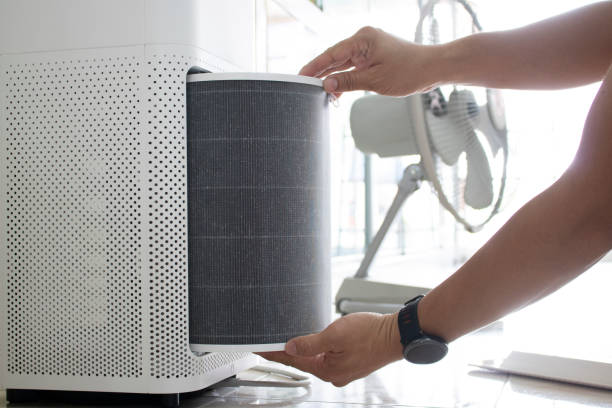 istock change air filter clean allergy room dust pm2.5 pollution 1289336338