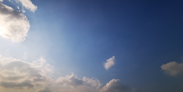 Clouds in blue sky background take picture via phone