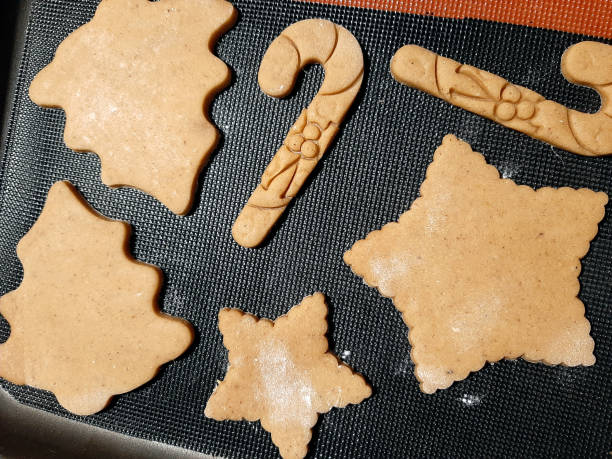 istock The dough is raw, cut with a mould, prepared for baking gingerbread 1289340120